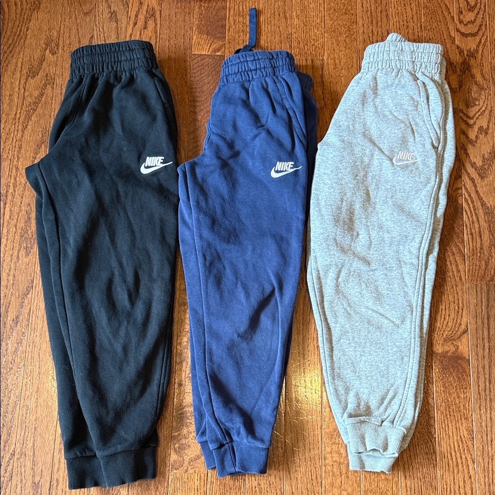 Size small lot of three pairs of Nike Kids fleece Sweatpants - Black, Blue, Gray